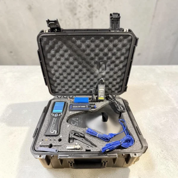 An open black rugged transit case with custom foam inserts displaying the Aaronia Spectran V5 handheld analyzer unit, an OmniLOG antenna, a HyperMD directional antenna, and accessories.