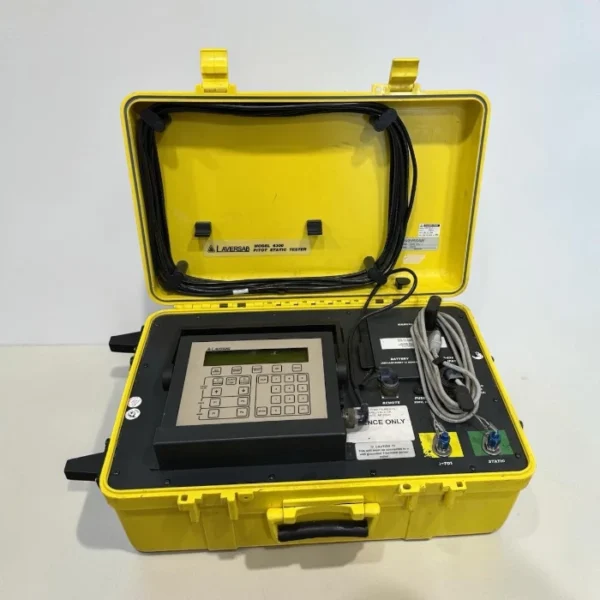 An open yellow rugged case containing the Laversab 6300 RVSM Pitot Static Tester with its wired remote control unit and connecting cables.