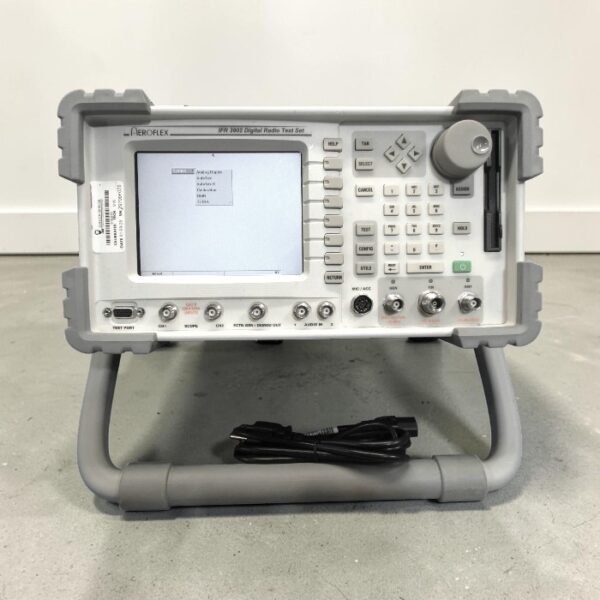 A front straight-on view of the Aeroflex IFR 3902 Digital Radio Test Set sitting on its grey tilt-bail stand with an active display showing a menu system.