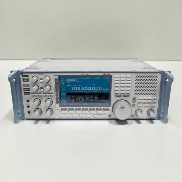 A straight-on front view of the ICOM IC-R9500 Communications Receiver with its large color display illuminated showing frequency settings.