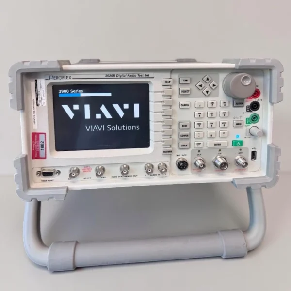 A front-facing overhead shot of a VIAVI Aeroflex 3920B Digital Radio Test Set propped on its bench stand, showing the VIAVI Solutions splash screen loading during startup.