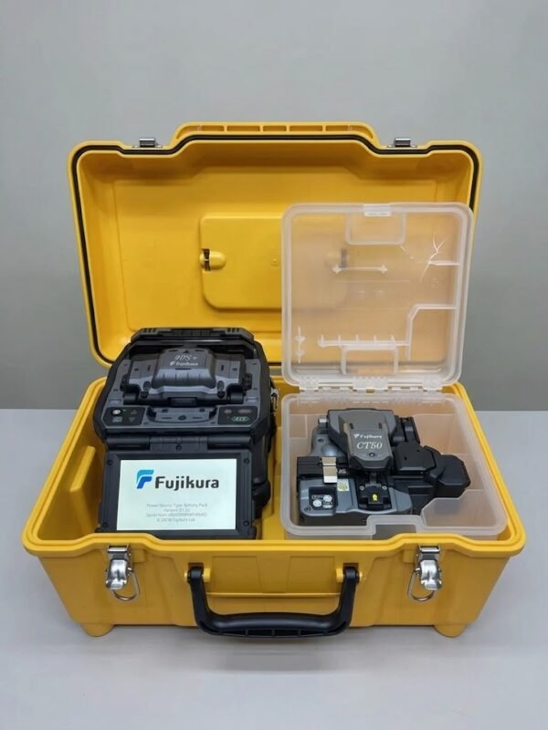 Open yellow hard plastic carrying case containing a black Fujikura 90S+ fusion splicer on the left with its screen showing, and a matching black Fujikura CT-50 fiber cleaver in its protective clear plastic box on the right.