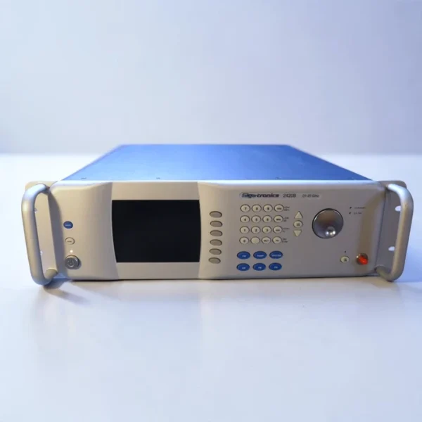 Front view of a Giga-tronics 2420B Microwave Signal Generator against a white background. The unit has rack-mount handles, a central display screen, a full numeric keypad, function keys (CW, RAMP, SYSTEM), and a large rotary control knob. The branding "Giga-tronics 2420B .01-20 GHz" is visible.